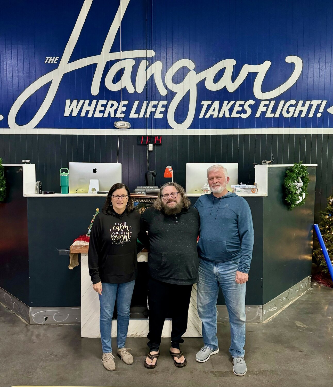 Mosaic House of Prayer held its 18th Annual Toy Blessing at the Hangar Unity Center in Brookshire on November 28th. Pictured are (left to right) Vickii Watson, Cassidy Campbell and Mark Watson. The Hangar, a nonprofit organization offering a variety of services to the community including activities for teens, resources for families in need and a variety of local events throughout the year for residents of southern Waller County, is located at 4010 4th St. in Brookshire.